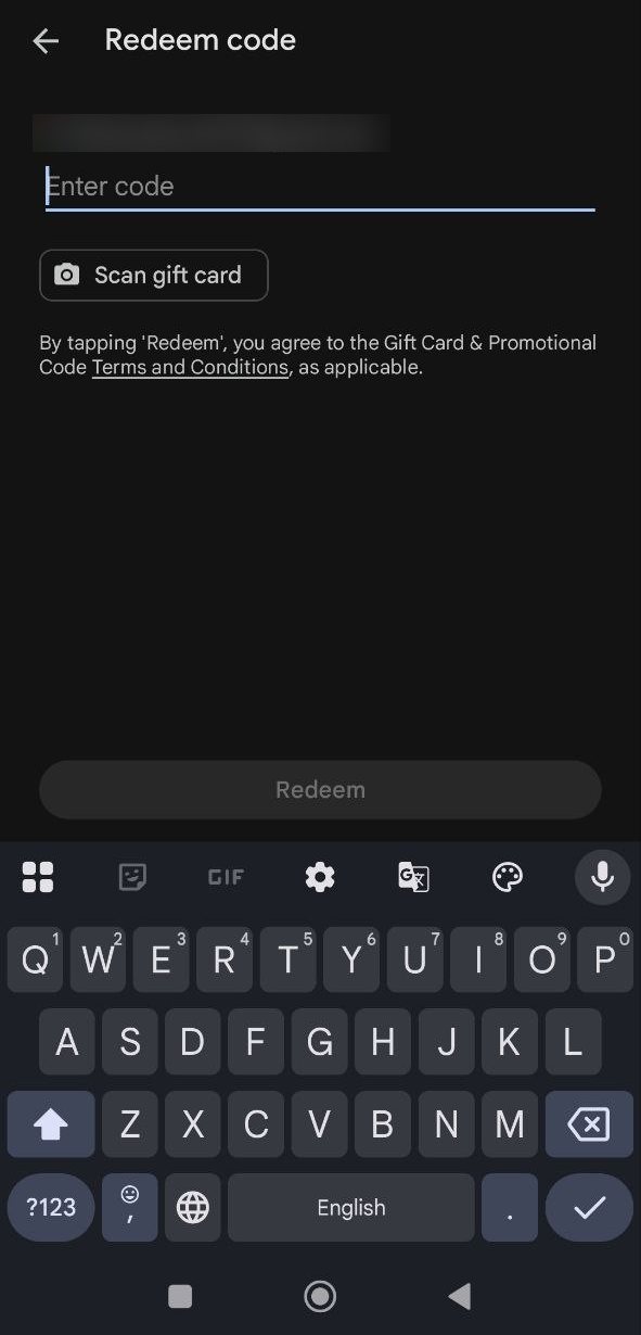 Google Play Redeem code screen with an Enter code field and a Redeem button.